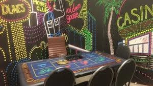 Live dealer at Asia Gaming studio operating multi-camera roulette table